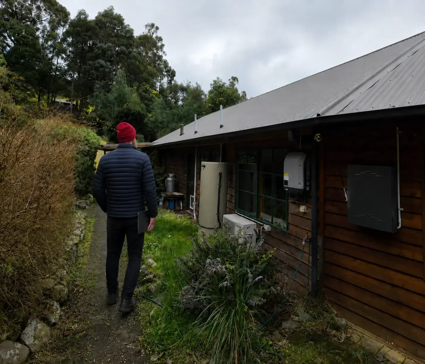 Independent energy advice during a property walk-through in Tasmania.